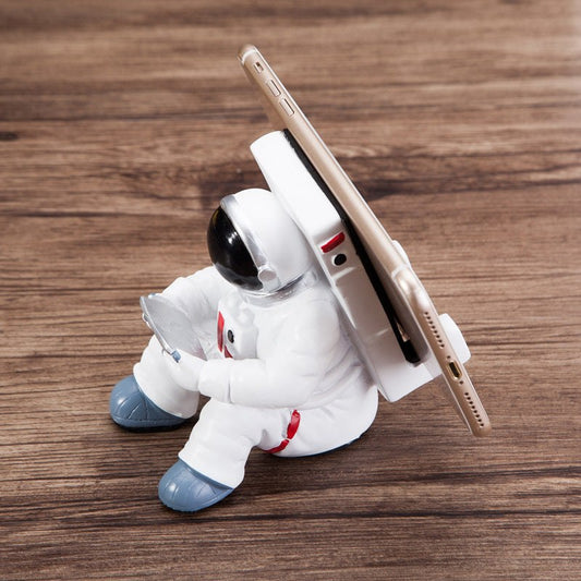 Angle shot of Space Spaceman Mobile Phone Desk Holder for a compact home office furniture
