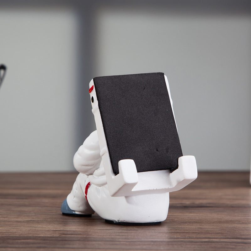 Space Spaceman Mobile Phone Desk Holder with simple astronaut design for student desktop accessories