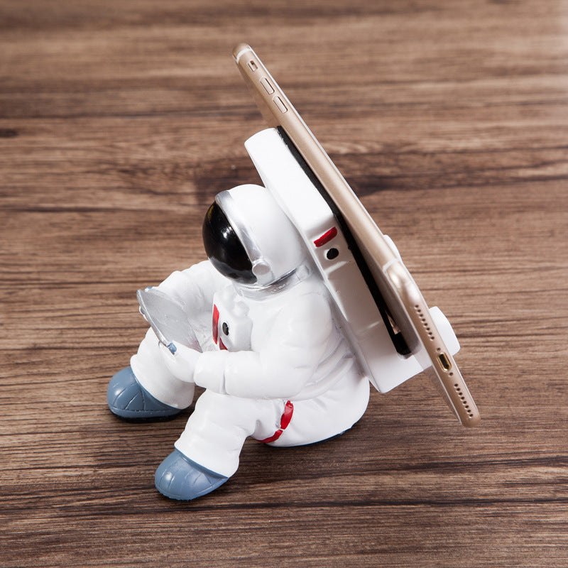 Angle shot of Space Spaceman Mobile Phone Desk Holder for a compact home office furniture