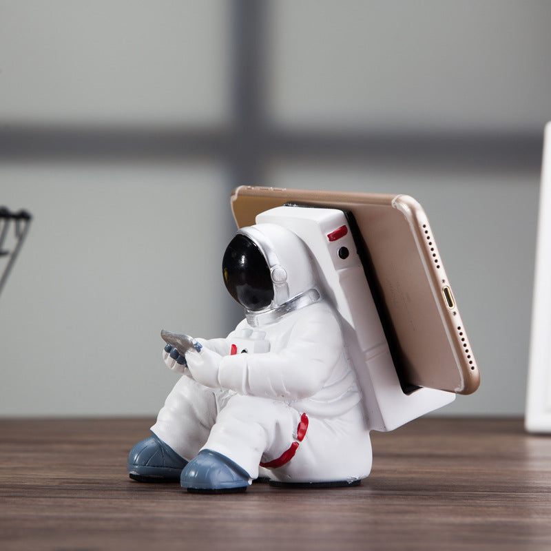 Space Spaceman Mobile Phone Desk Holder with a futuristic astronaut design for a unique home office accessory
