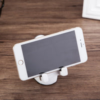 Lifestyle shot of Space Spaceman Mobile Phone Desk Holder in a modern home office setup
